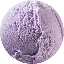 A close up of a scoop of reduced sugar purple ice cream.