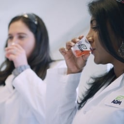 Scientist tasting flavors in a lab