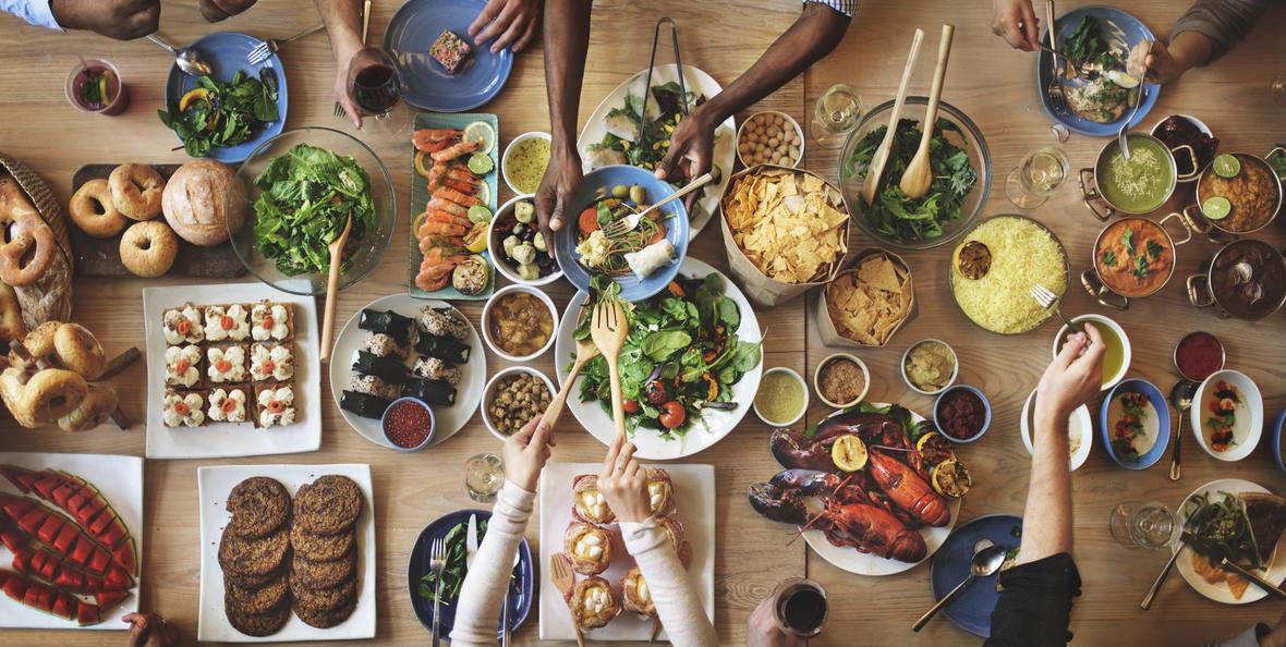 People enjoying a variety of tasty foods